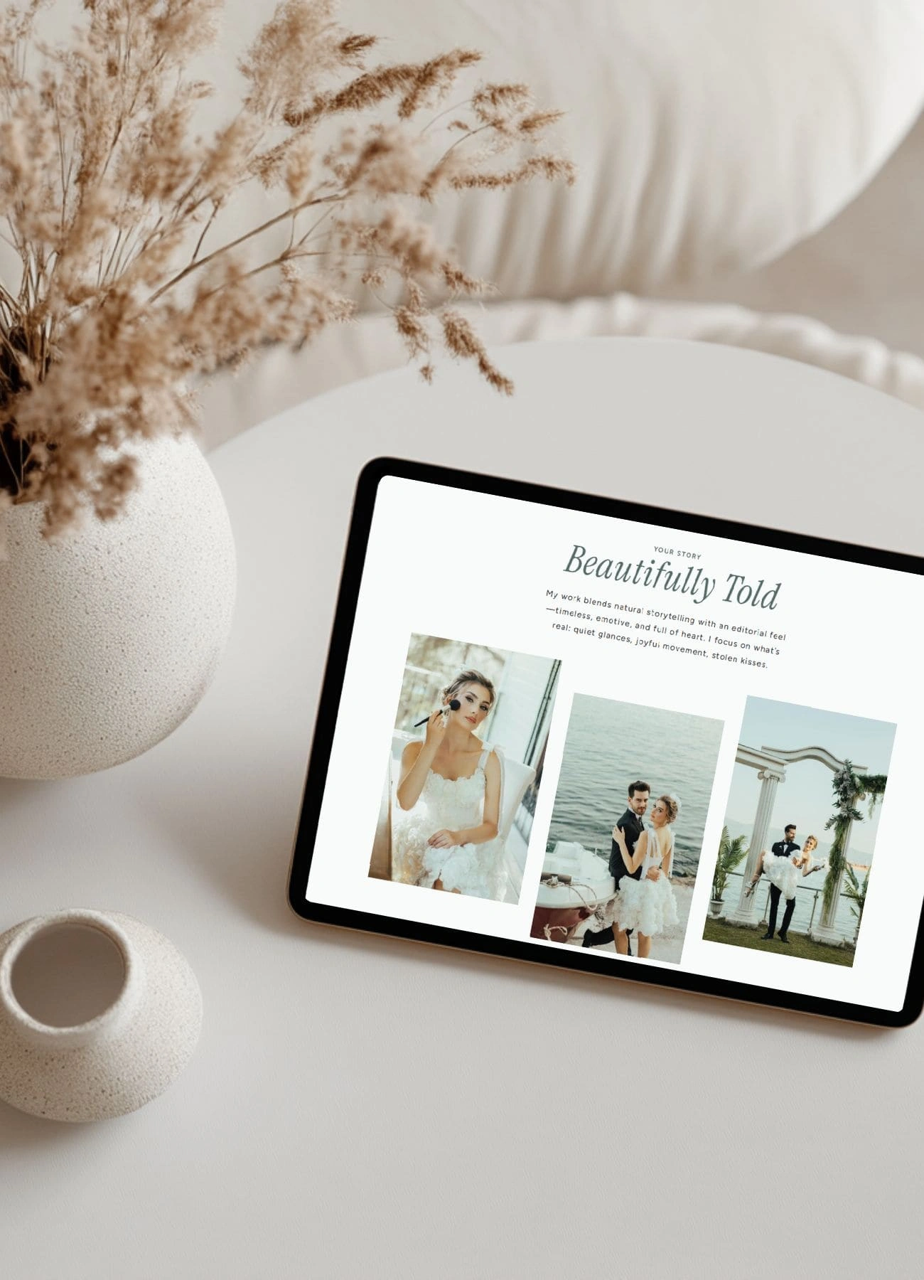 Luxury wedding planner website displayed on a tablet with elegant bridal portraits and modern minimalist design